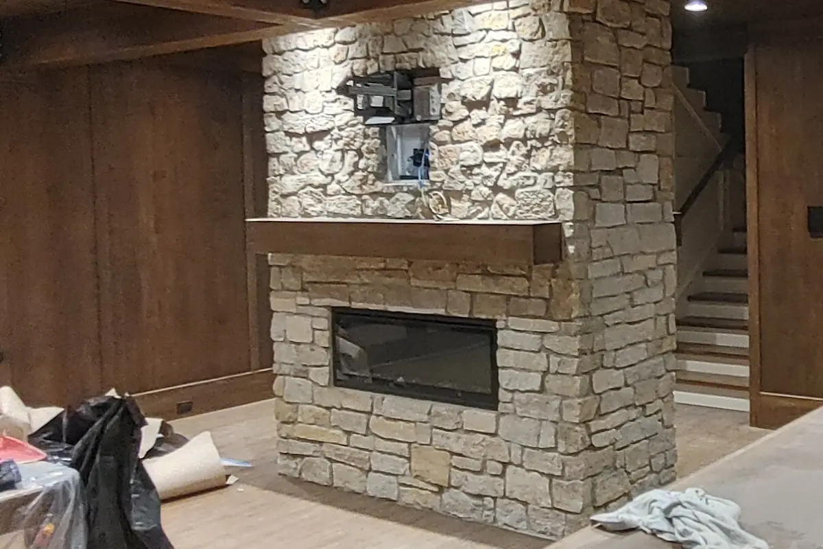 Interior stone fireplace installation